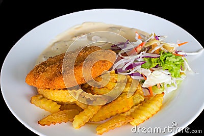 Schnitzel cutlet with potato and salad. Fried chicken cutlet top view photo on wooden table Stock Photo