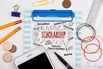 Scholarship concept. Chart with keywords and icons. Office desk with stationery and mobile phone Stock Photo