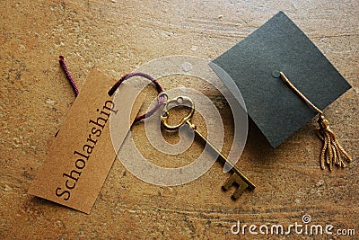 Scholarship key and cap Stock Photo