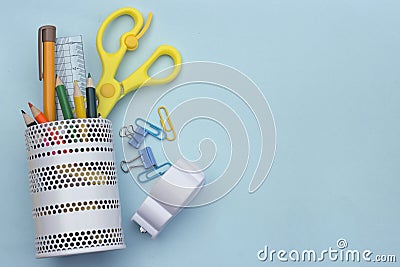 School accessories on soft blue background. Back to school concept. Creativity for kids. Colorful school background. top view, cop Stock Photo