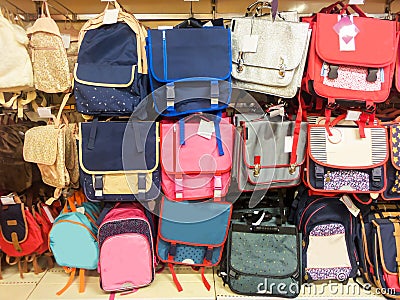 School bags in a supermarket, back to school concept Stock Photo