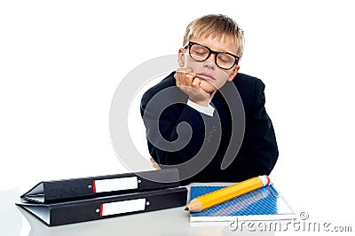 School boy in glasses dozing off Stock Photo