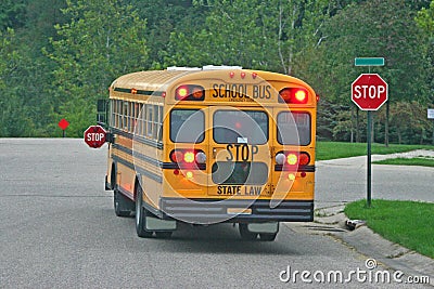 School Bus at Stop Sign Stock Photo