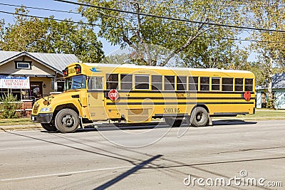 school busses on the way in Boerne, Texas, USA. School busses are free for pupils in the USA Editorial Stock Photo