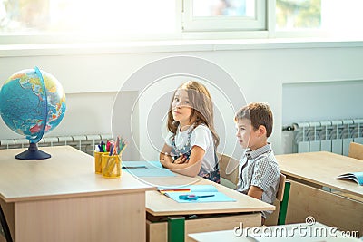 School children participating actively in class. Education, learning, high school Stock Photo