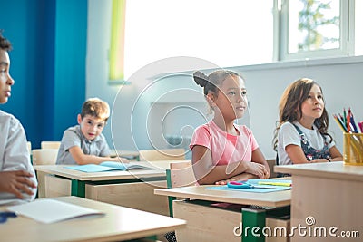 School children participating actively in class. Education, learning, high school Stock Photo