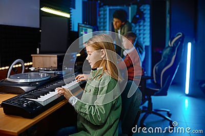 School children at sound record studio Stock Photo