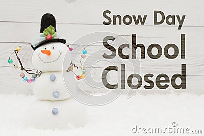 School Closed message with a snowman Stock Photo