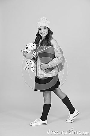 School creating textbooks generation. Active role in curriculum. Schoolgirl with textbooks. Innovating existing Stock Photo