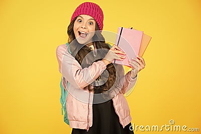 School creating textbooks generation. Active role in curriculum. Schoolgirl with textbooks. Textbook useful in learning Stock Photo