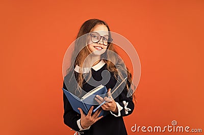 School education concept. Private college. Nerd lifestyle. Cute kid studying. Basic education. Student with book Stock Photo