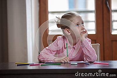 School girl boring and tired looking up, kid in isolation Stock Photo