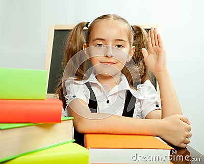 School girl ready to answer for teacher question Stock Photo