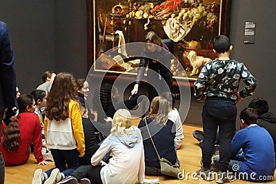 School kids study a painting in the Rijks Museum Editorial Stock Photo