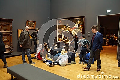 School kids study a painting in the Rijks Museum Editorial Stock Photo