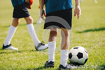 School Kids Training Football on Pitch Group of Young School Age Boys On Training Session With Youth Coach Stock Photo