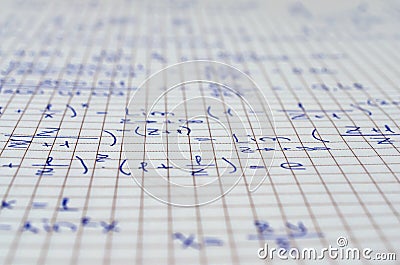 School Notebook With Handwritten Algebra Equations Stock Photo