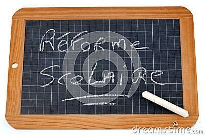 School reform written in French on a school slate Stock Photo