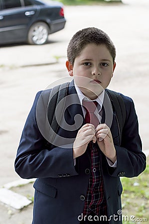 The school student comes home from school Stock Photo