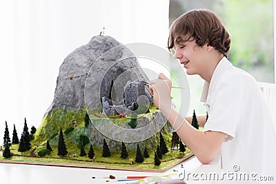 School student working on model building project Stock Photo