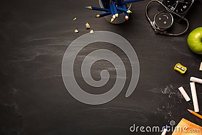 School supplies on blackboard. concept: back to school, school`s out, school holidays Stock Photo