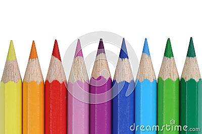 School supplies colored pencils in a row, isolated Stock Photo