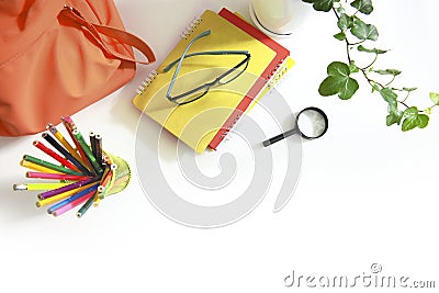 School supplies top view. Desktop white color with educational tools. Studens`s accessories flat lay empty copy space. Pancils, Stock Photo