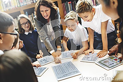 School Teacher Teaching Students Learning Concept Stock Photo