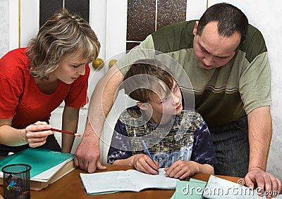 Schoolboy and parents Stock Photo