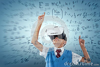 Composite image of schoolboy wearing virtual reality headset enjoying Stock Photo