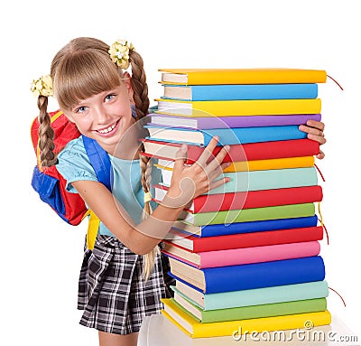 Schoolgirl with backpack holding pile of books. Stock Photo