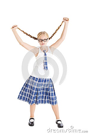 Schoolgirl stretches aside their long braids. Stock Photo