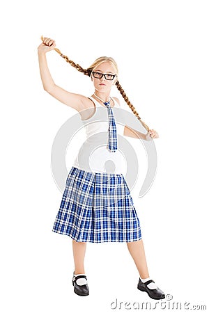 Schoolgirl stretches aside their long braids. Stock Photo