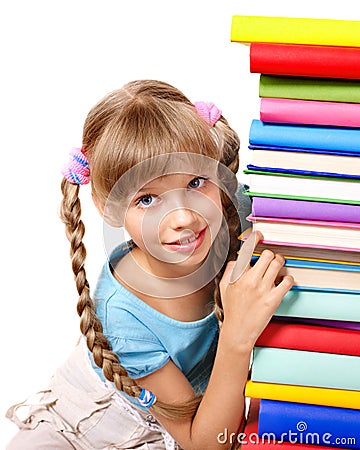 Schoolgirl holding pile of books. Stock Photo