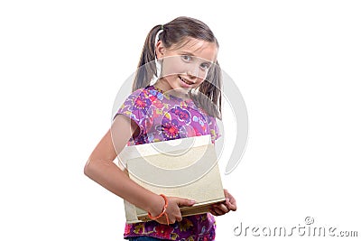 Schoolgirl with pile of books Stock Photo