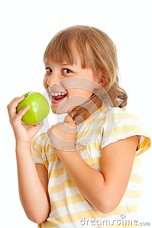 Schoolgirl portrait eating green apple isolated Stock Photo