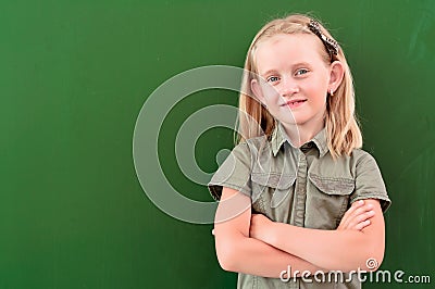 Schoolgirl portrait near the blackboards Stock Photo