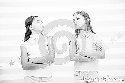 Schoolgirls haughty arrogant with folded arms chest. Best friends become enemies. Friendship relations issues. Girlish Stock Photo