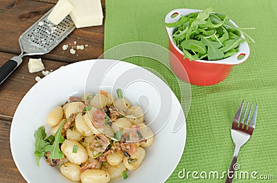 Schwarzwald gnocchi with ham, onion and wine Stock Photo