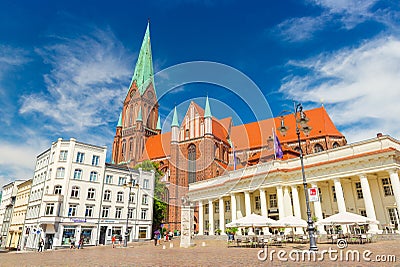 View of the central square in Schwerin and one of its main landmarks - Cathedral Schweriner Dom Editorial Stock Photo