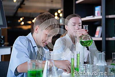 Science classroom helps students learn to observe, investigate and experiment about natural phenomena and then systematize results Stock Photo