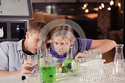 Science classroom helps students learn to observe, investigate and experiment about natural phenomena and then systematize results Stock Photo