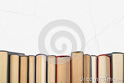 Science and education - Closeup group books white wall Stock Photo