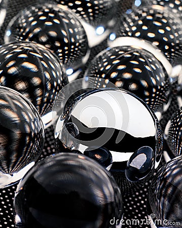 Glass Orbs Sitting on a Patterned Surface Stock Photo