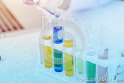 Science lab chemical test closeup drop liquid in glass tube Stock Photo