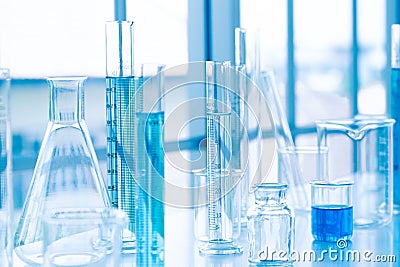 Science laboratory test tubes. Liquid substance in equipment glassware for chemistry biology samples. Stock Photo