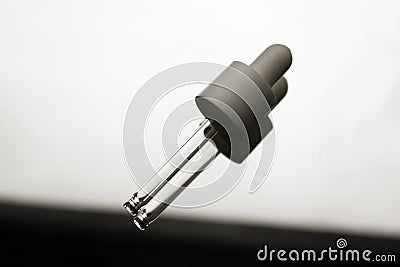 Science Pipet on monochrome Stock Photo