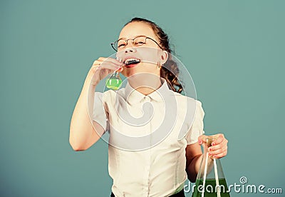 Science research in lab. Small school girl. small smart girl with testing flask. child study bilogy lesson. education Stock Photo