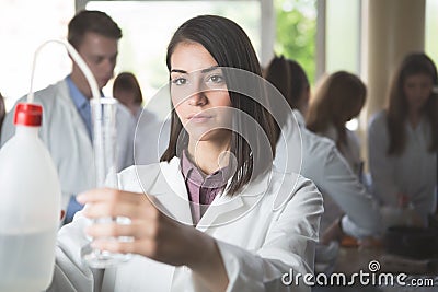 Science students working with chemicals in the lab at the university.Happy student, content for experimental results Stock Photo