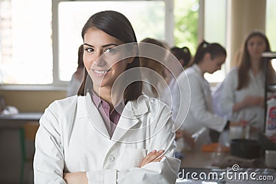 Science students working with chemicals in the lab at the university. Happy student, content for experimental results Stock Photo